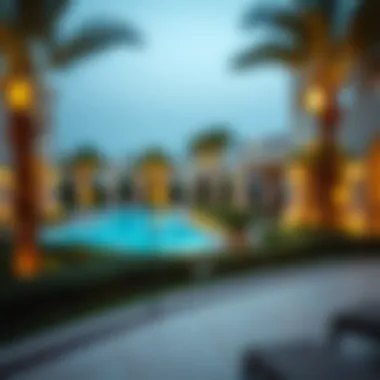 Exclusive Community Amenities in Al Gurm Luxurious community amenities in Al Gurm featuring a pool and garden