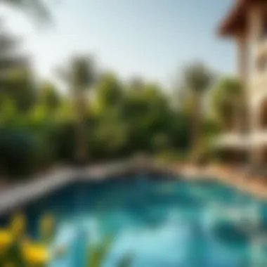 Exquisite Outdoor Amenities in Emirates Hills Luxurious swimming pool surrounded by lush greenery