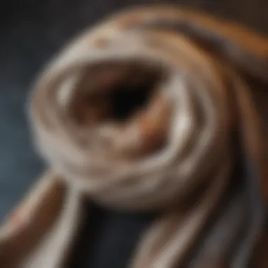 Chic Luxury Scarves A fashionable scarf laid on a textured surface