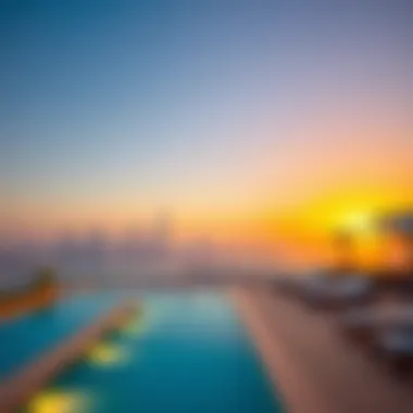 Elegant Outdoor Pool with Skyline View Elegant outdoor pool overlooking Dubai's skyline at sunset