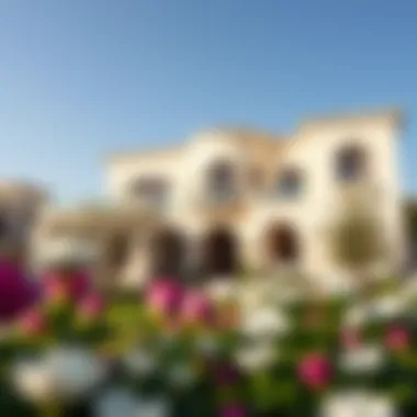 A stunning view of a spring villa showcasing its architectural elegance amidst blooming gardens.