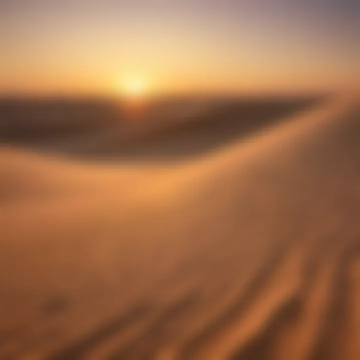 Golden waves of sand in the Dubai desert under a vibrant sunset