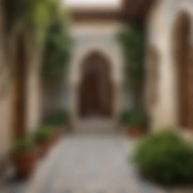 Intricate Tile Work in a Traditional Arabian Courtyard A traditional Arabian courtyard showcasing intricate tile work and lush greenery