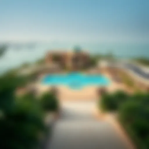 Panoramic view of the serene Park Hyatt Dubai pool surrounded by lush greenery